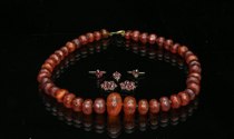 Appraisal: Amber Necklce and Ruby Parts Dark amber beads intermitted with