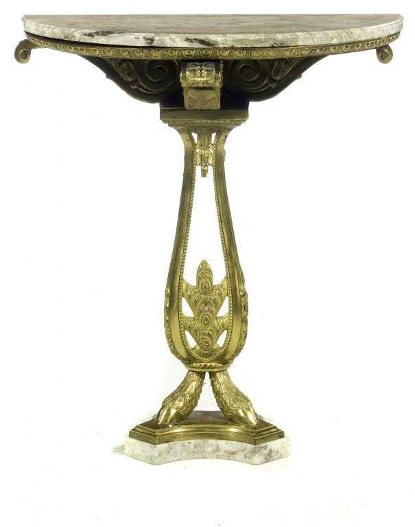 Appraisal: A DECORATIVE GILT BRONZE CONSOLE TABLE the semi-circular top with