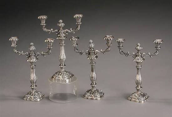 Appraisal: Set of Four Austrian Weighted Silver Two-Light Convertible Candelabra Maker's