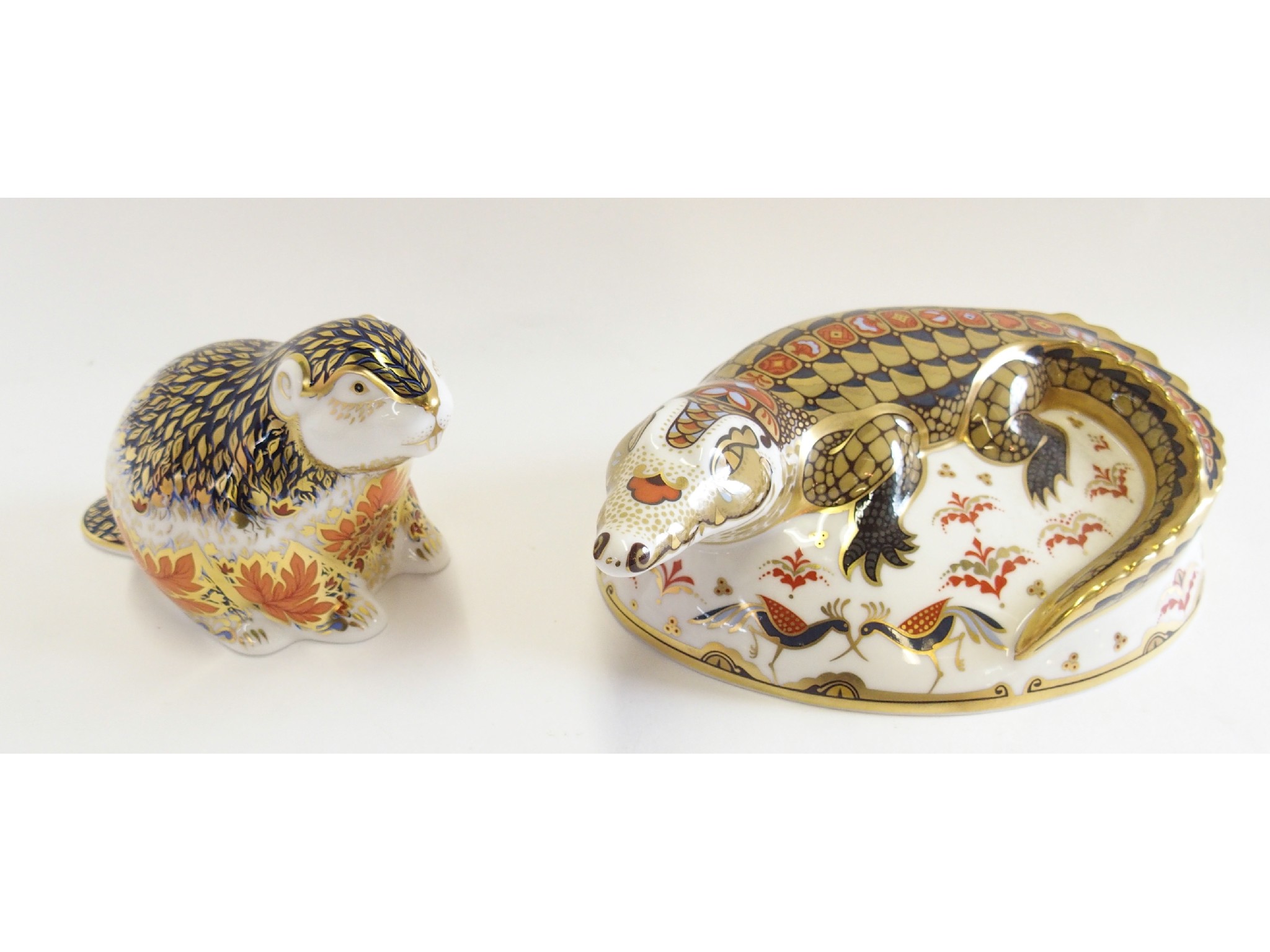 Appraisal: Two Royal Crown Derby porcelain paperweights Riverbank Beaver and Crocodile