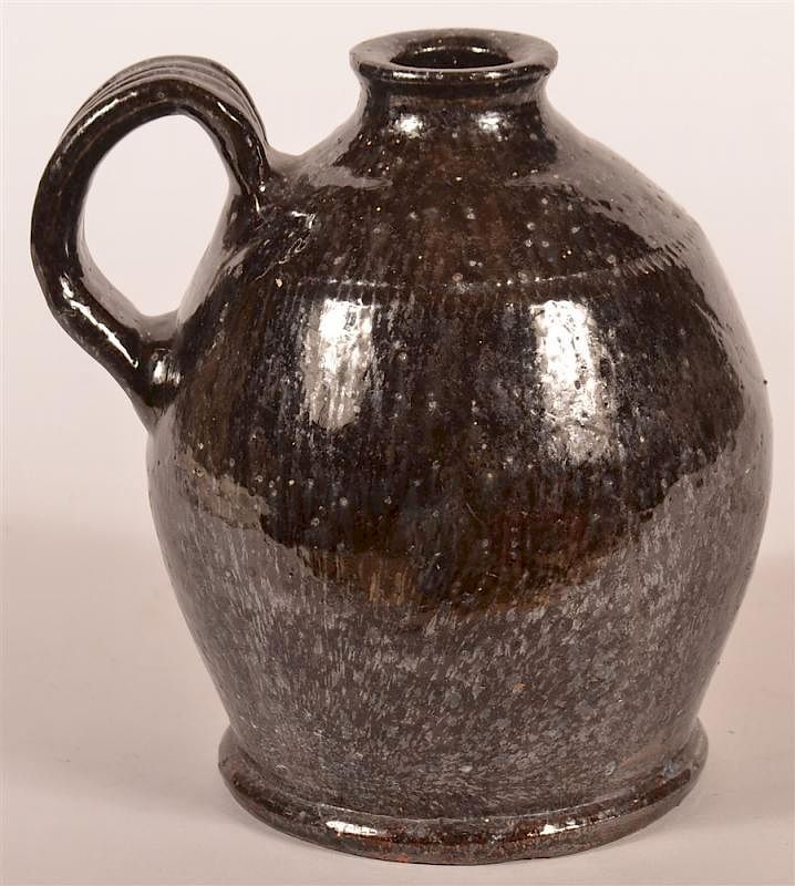 Appraisal: th C PA Glazed Redware Jug with Strap Handle th