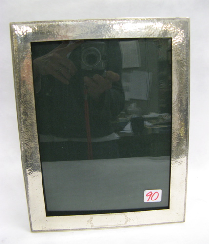 Appraisal: WILLIAM B KERR STERLING SILVER PHOTOGRAPH FRAME hammered and engraved