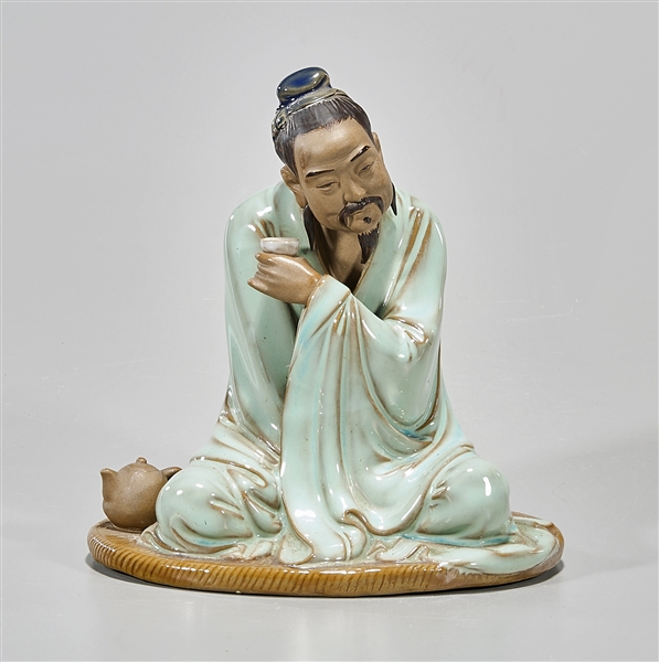 Appraisal: Chinese glazed porcelain seated figure x x approx Condition wear