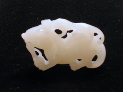 Appraisal: Chinese white jade carving Carved from a single section well