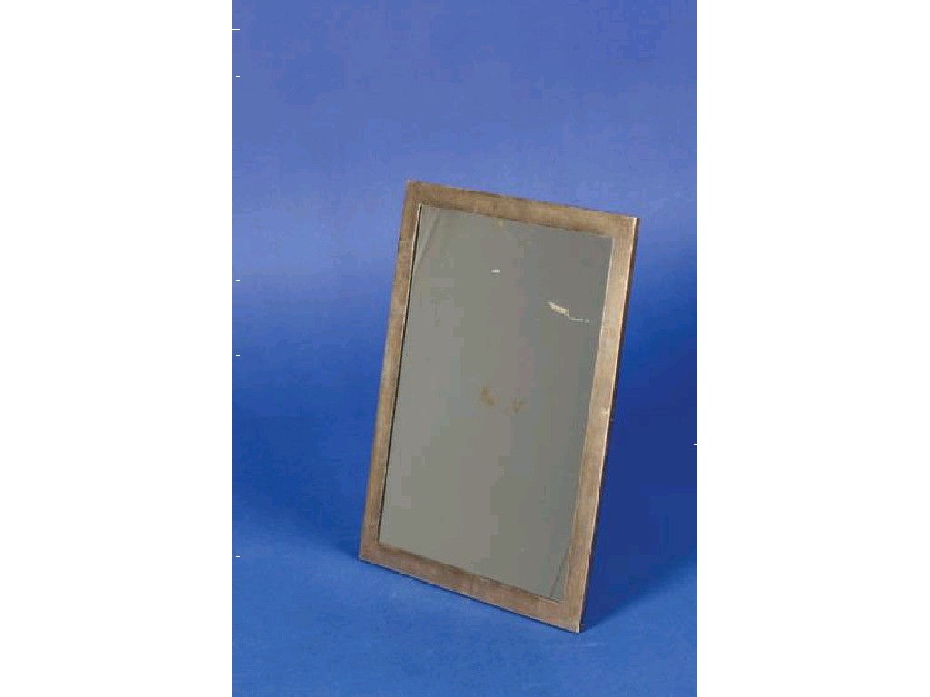 Appraisal: A SILVER MOUNTED MIRROR of upright rectangular form with an