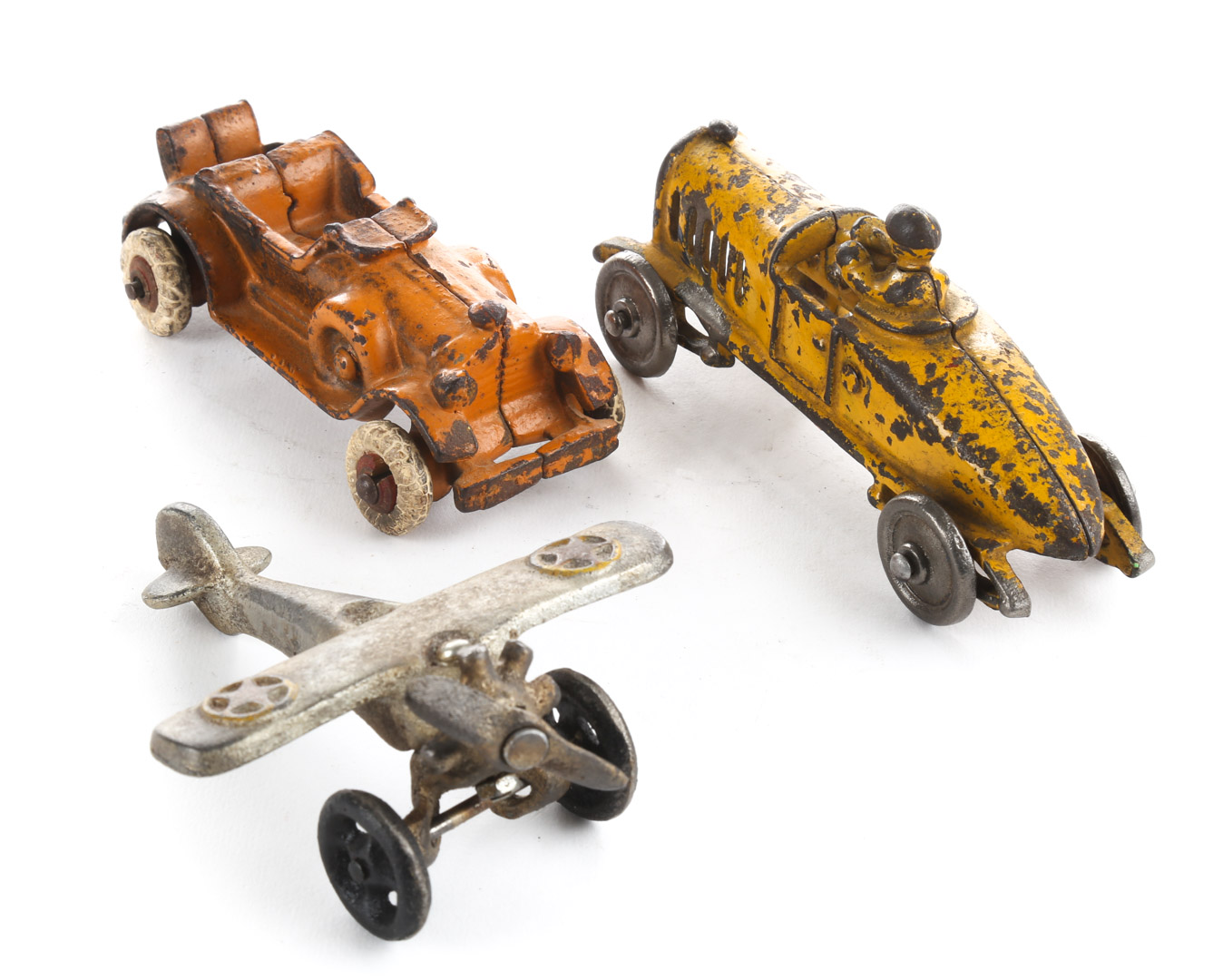 Appraisal: Two cast iron cars and airplane s including Hubley roadster