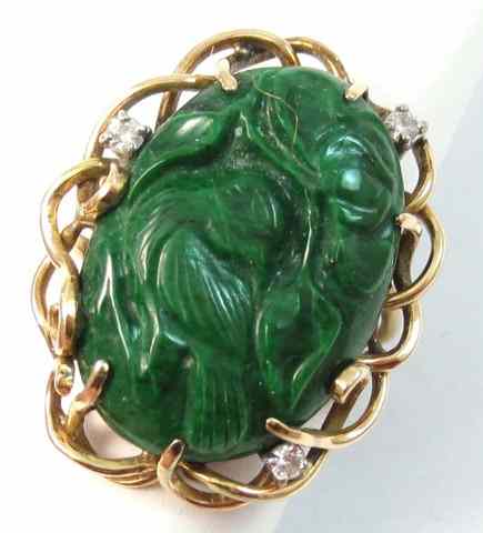 Appraisal: MALACHITE AND DIAMOND RING k gold with three round-cut diamonds