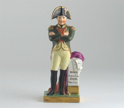 Appraisal: A Derby bone china figure of Napoleon standing beside a