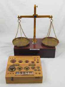 Appraisal: A box mounted set of precision scales together with a