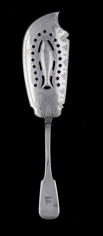 Appraisal: AN IRISH GEORGE IV FISH SLICE Fiddle pattern pierced embossed