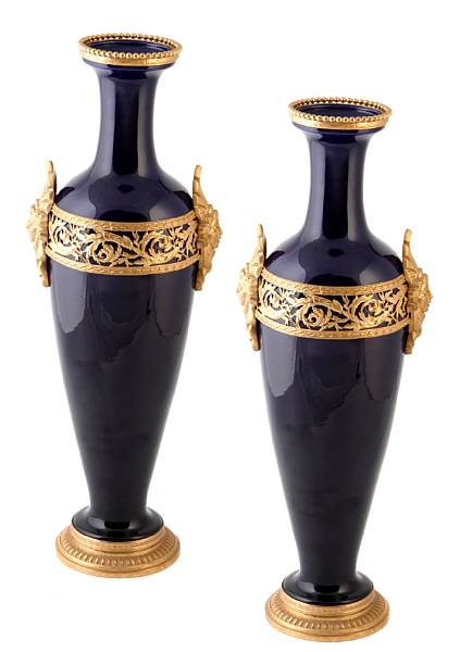 Appraisal: A pair of Empire style cobalt glazed and gilt metal