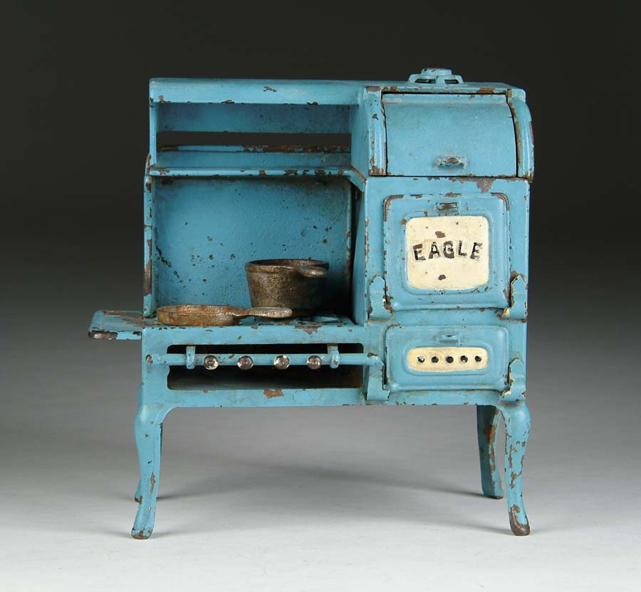 Appraisal: CAST IRON EAGLE STOVE A finely detailed iron gas stove