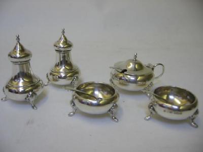 Appraisal: A FIVE PIECE CRUET Sheffield comprising a pair of baluster