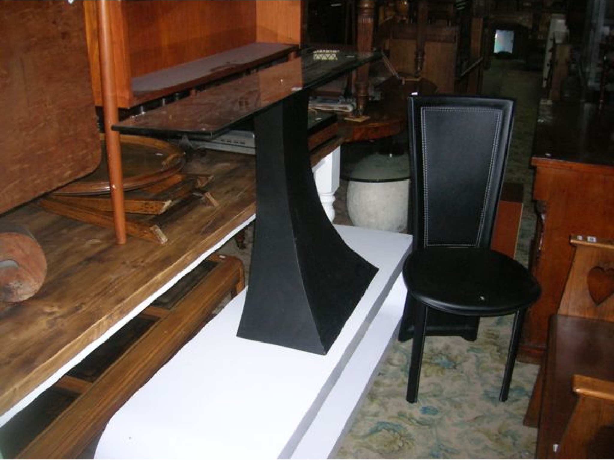 Appraisal: A contemporary modernist hall table the rectangular plate glass top