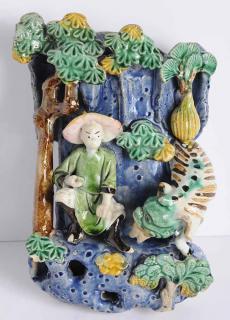 Appraisal: Chinese Glazed Ceramic Figural Group Wall Pocket depicting man and