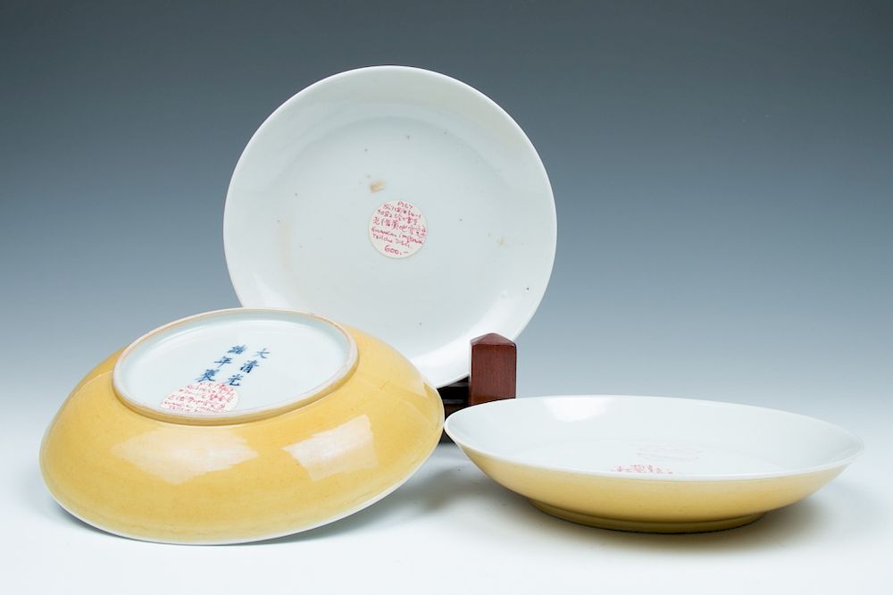 Appraisal: THREE YELLOW GLAZED DISHES GUANGXU MARK PERIOD A group of