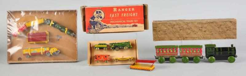 Appraisal: Lot of Tin Plastic Train Sets American Includes two Marx