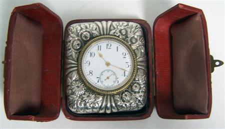 Appraisal: A Victorian travelling timepiece mark indistinct but circa of rounded