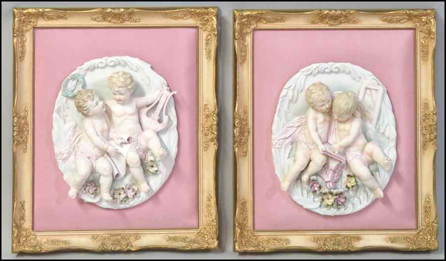 Appraisal: PAIR OF CONTINENTAL PAINTED BISQUE PORCELAIN FRAMED PLAQUES '' x