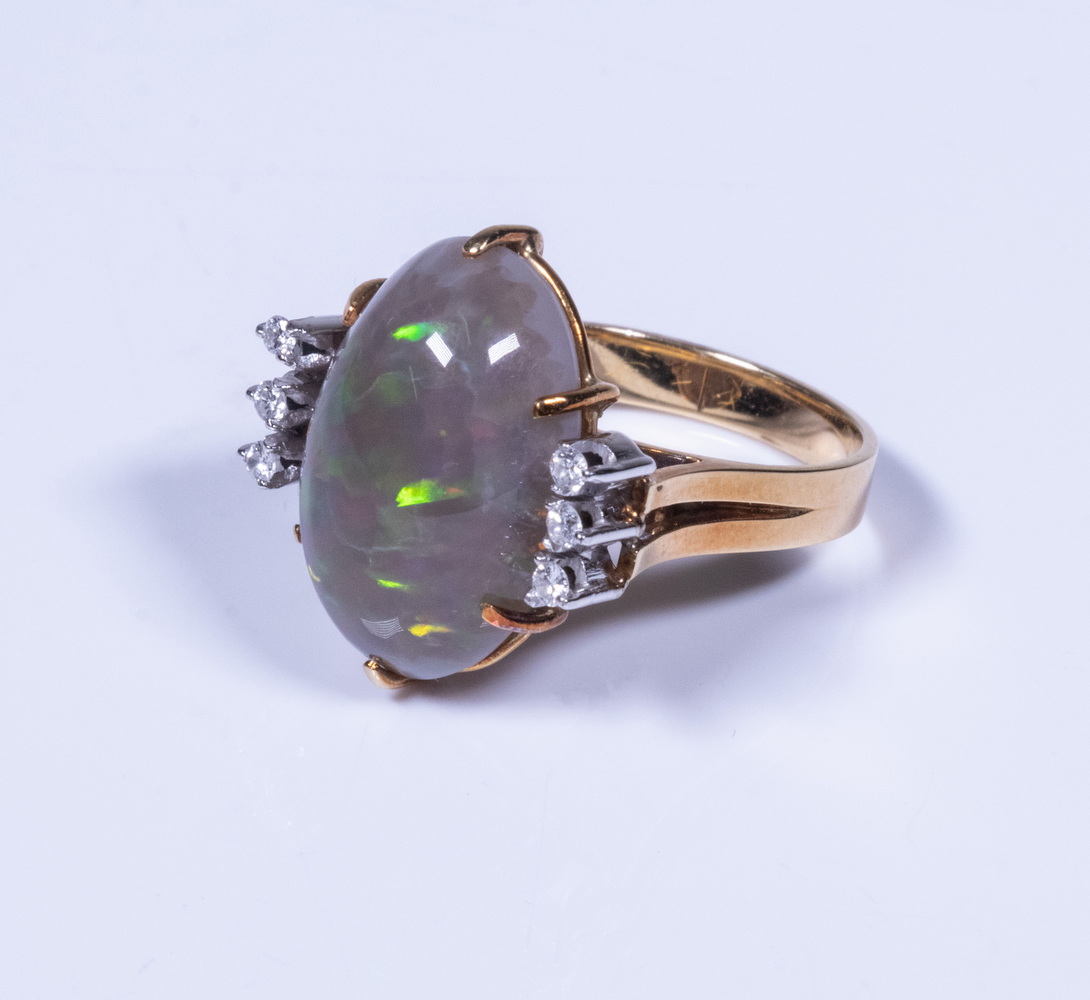 Appraisal: CUSTOM K GOLD BLACK OPAL RING Set with a central