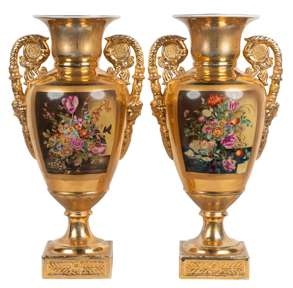 Appraisal: PAIR OF PORCELAIN URNSpainted to each side with a floral