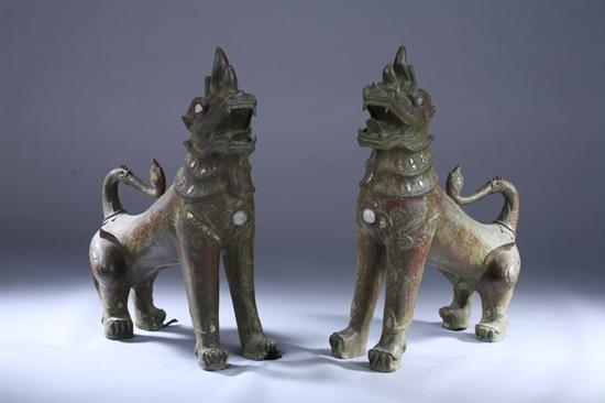 Appraisal: PAIR THAI BRONZE FIGURES OF MYTHICAL BEASTS th century -