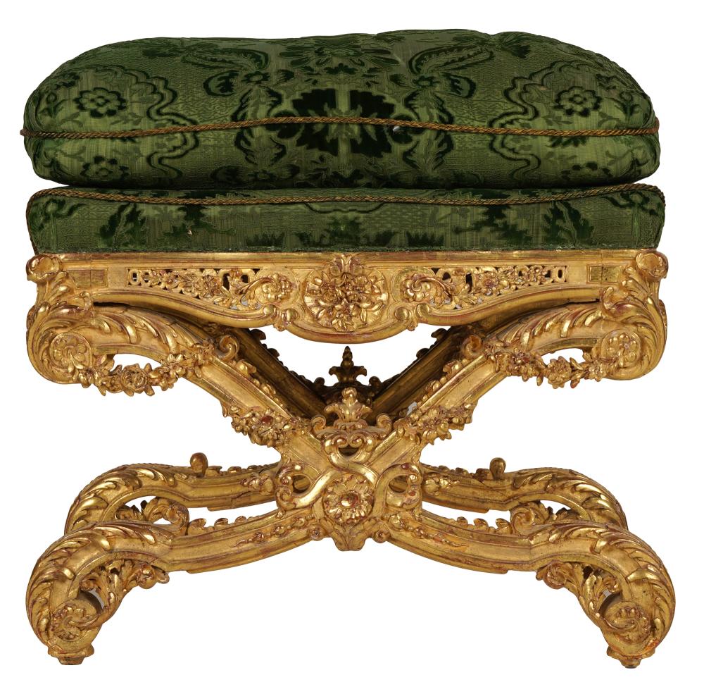 Appraisal: CARVED GILTWOOD STOOLthe cushion covered with green damask on X-form