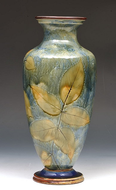 Appraisal: A TALL STONE WARE BALUSTER VASE with leaf decoration cm