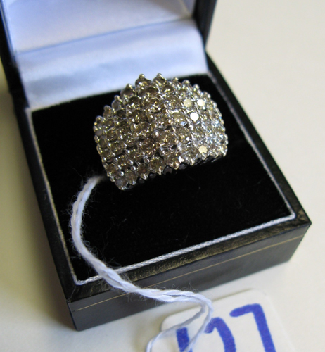 Appraisal: DIAMOND AND TEN KARAT YELLOW AND WHITE GOLD CLUSTER RING