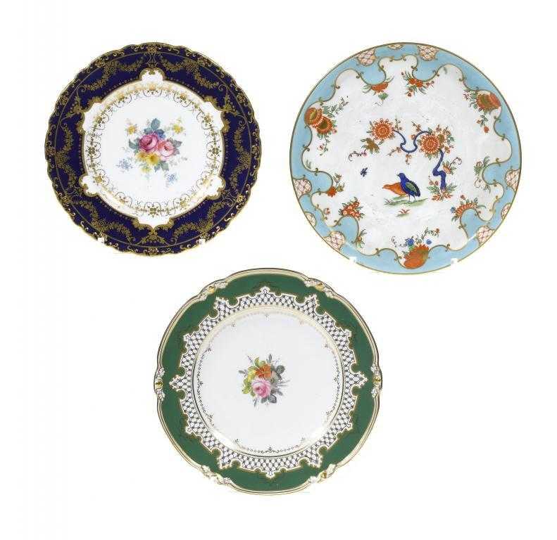 Appraisal: TWO ROYAL CROWN DERBY PLATES painted with a central group