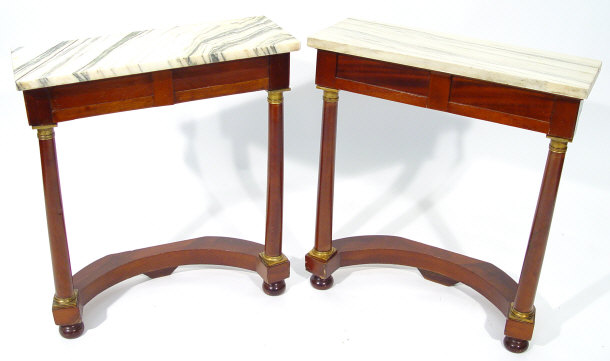 Appraisal: Pair of Empire style mahogany console tables with grey veined