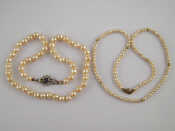 Appraisal: Two cultured pearl necklaces one approx cm long pearls approx