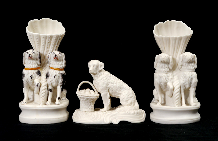 Appraisal: PARIAN BENNINGTON DOG SPILL VASES AND FIGURINE pieces total to