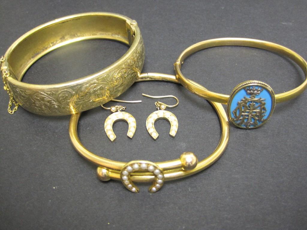 Appraisal: A ct gold Bangle with monogram on a blue ground