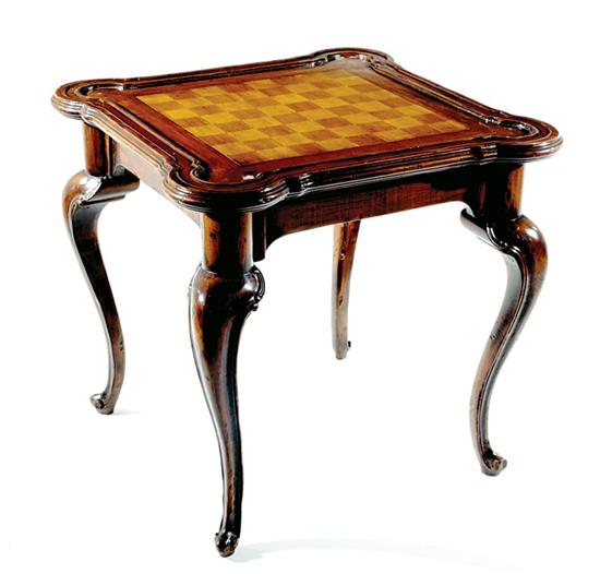 Appraisal: Georgian style mixed wood game table top with lobed corners