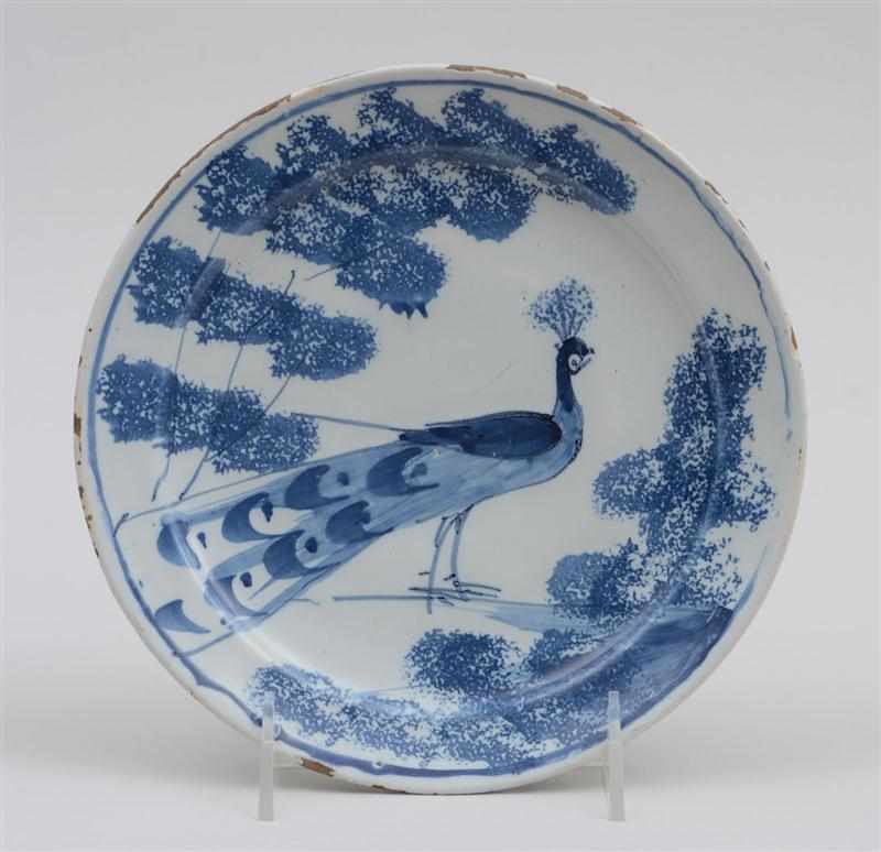 Appraisal: BRISTOL DELFT BLUE AND WHITE SMALL PLATE Depicting a peacock