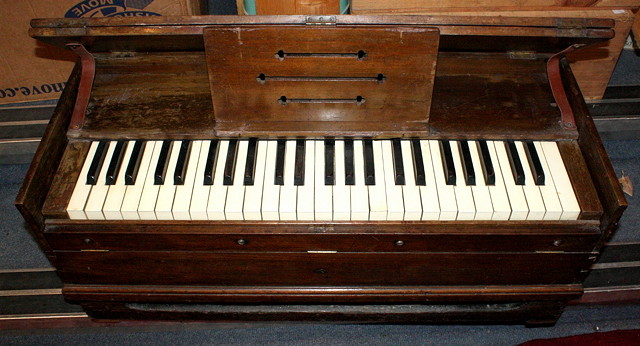 Appraisal: A TH CENTURY PORTABLE HARMONIUM the instrument with folding stand