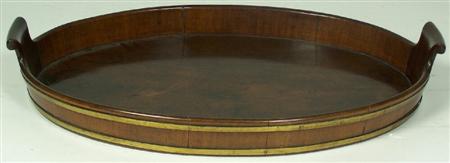 Appraisal: A George III mahogany and coopered oval tray the brass