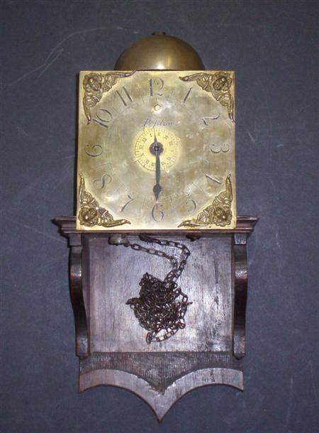 Appraisal: A hanging alarm clock The dial marked Peplow the brass