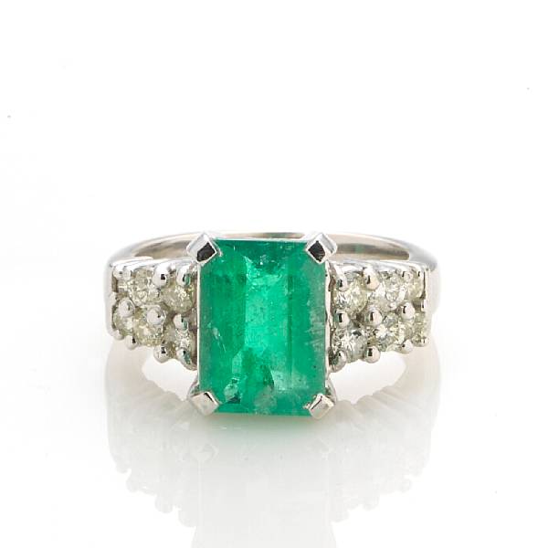 Appraisal: An emerald and diamond ring emerald weighing approximately carats mounted