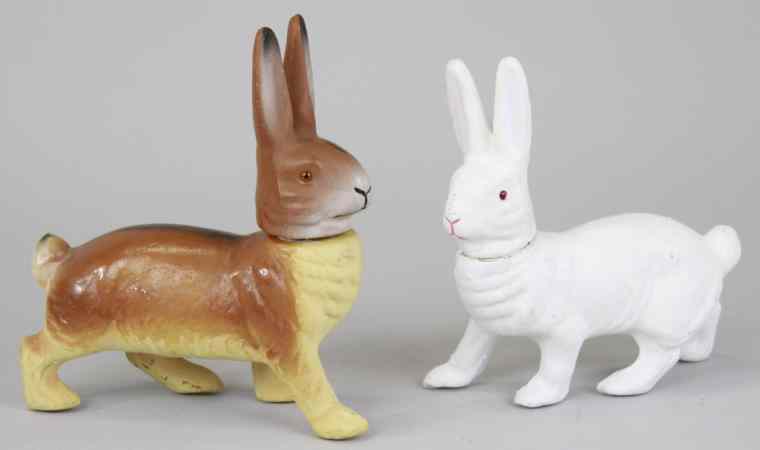 Appraisal: TWO EASTER RABBIT CANDY CONTAINERS A chocolate brown snow white