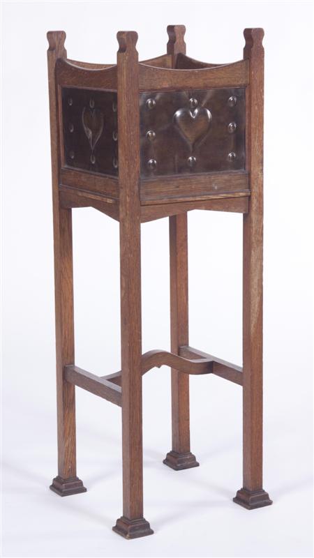 Appraisal: SHAPLAND PETTER BARNSTAPLE JARDINIERE CIRCA oak and brass the panelled