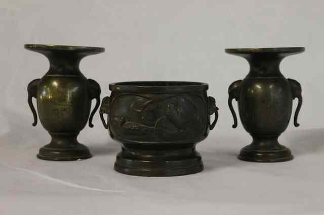 Appraisal: A PAIR OF JAPANESE BRONZE FLARED VASES with elephant handles