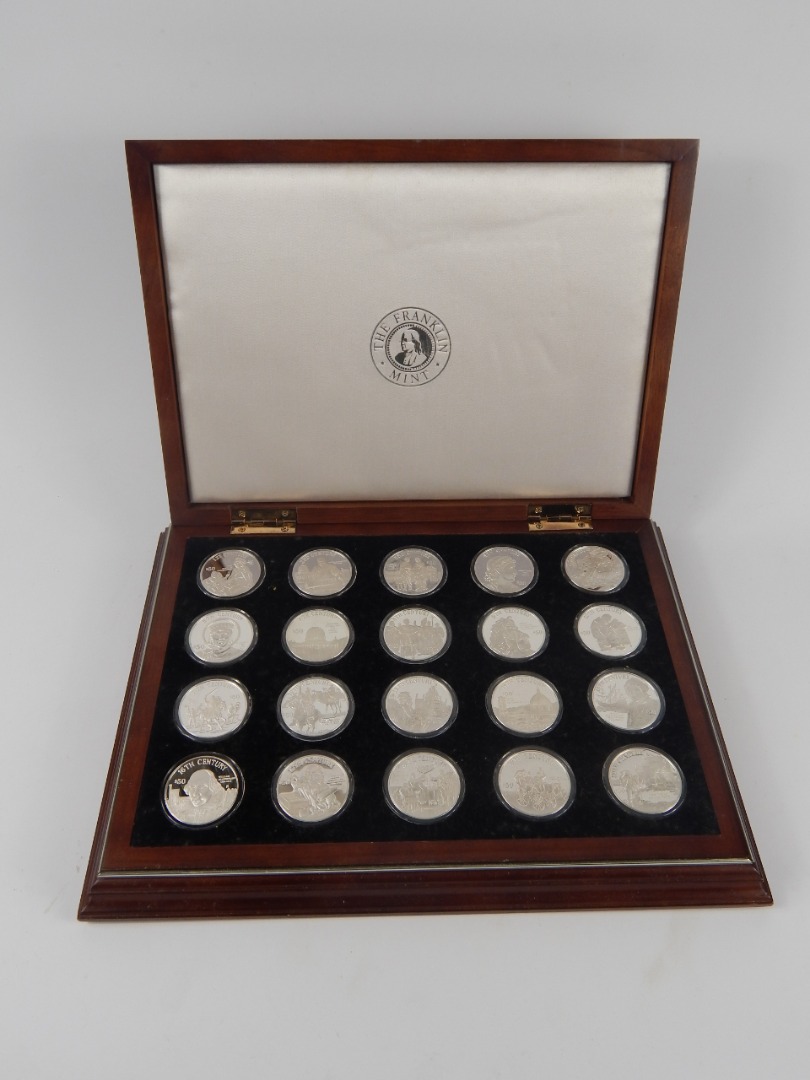 Appraisal: A Franklin Mint Official Millennia Silver Coin Collection twenty coins