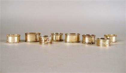 Appraisal: Eight English sterling silver napkin rings th century Comprising a