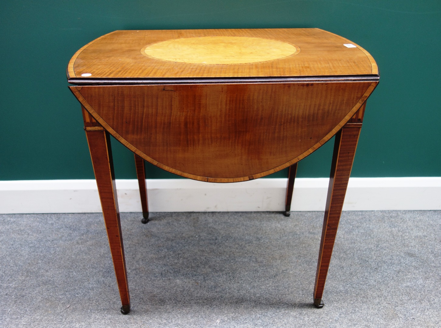 Appraisal: A George III satinwood mahogany and tulipwood banded Pembroke table