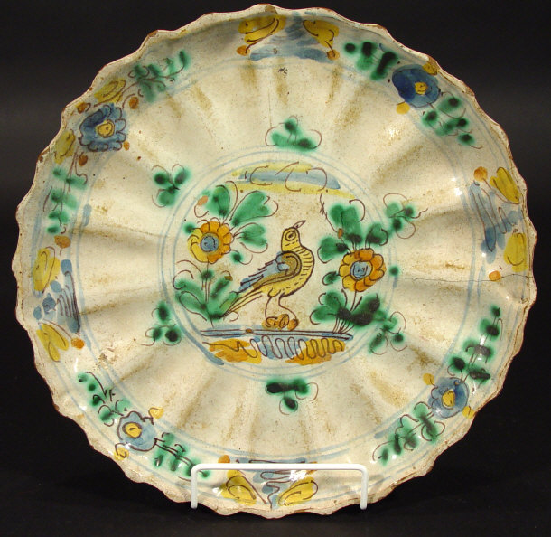 Appraisal: Continental Faience glazed pottery tazza hand painted with a bird