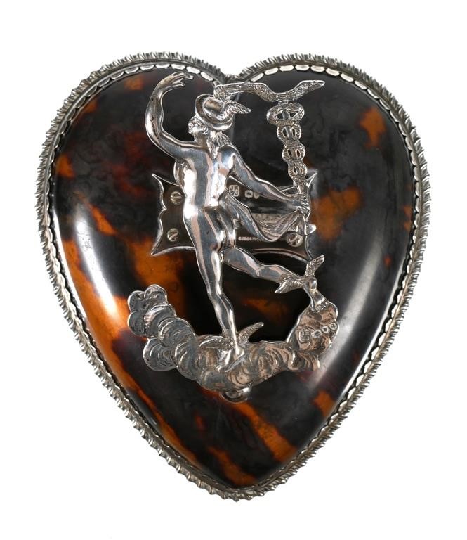 Appraisal: English sterling silver and tortoiseshell heart with figural Mercury clip