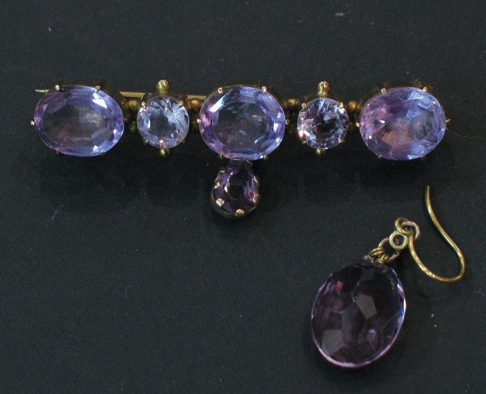 Appraisal: AN EARLY TH CENTURY AMETHYST BAR BROOCH set with three