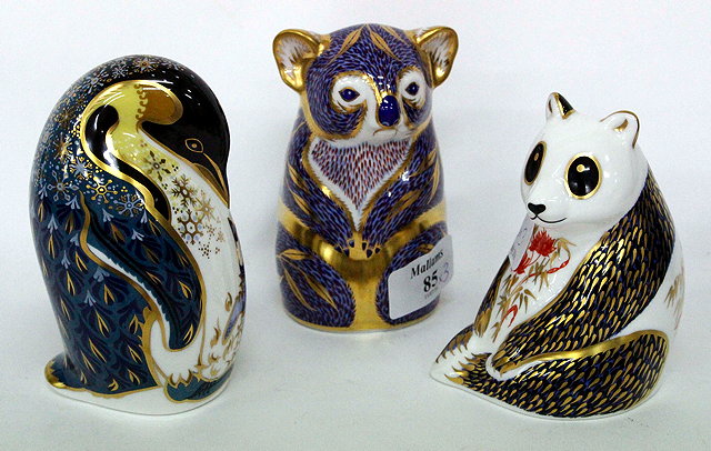 Appraisal: THREE ROYAL CROWN DERBY IMARI PATTERN PAPERWEIGHTS of exotic animals